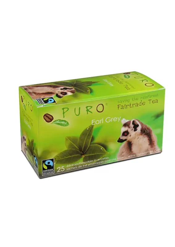 En boks med puro fairtrade earl grey te, med en lemur på emballasjen, med 25 teposer inni. boksen fremhever en miljøårsak.