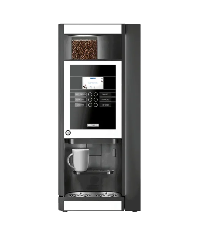 En moderne, høy Wittenborg 95 kaffemaskin med digitalt grensesnitt, bønnerom og en kaffekopp i holderen.